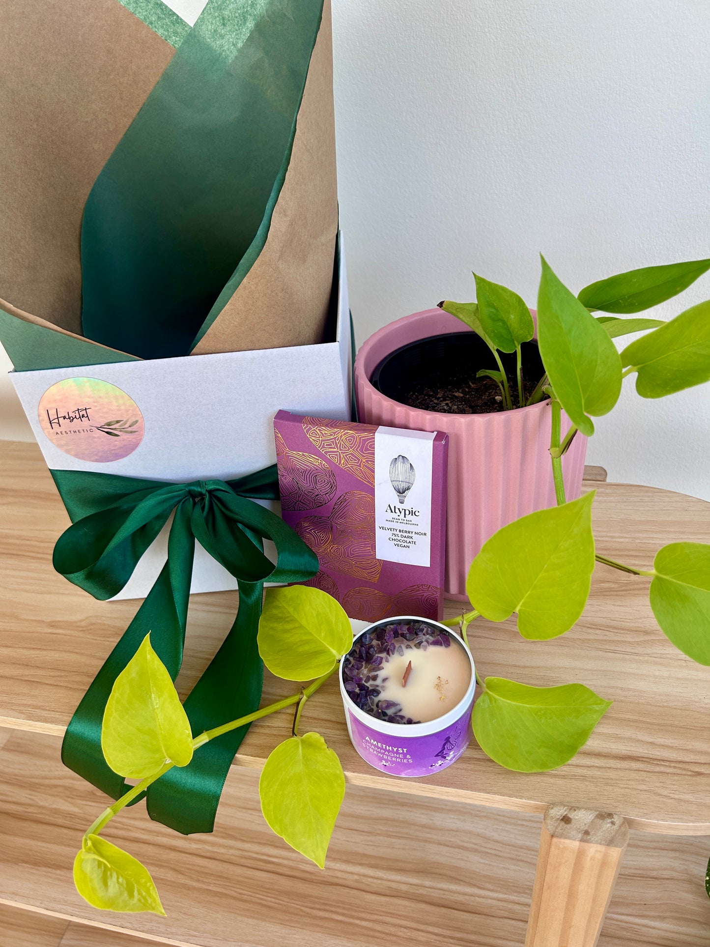 Love Grows Gift Box Neon Pothos Epipremnum Aureum Heart Shaped Leaf in Pink Ribbed Pot with Amethyst Soy Gem Candle and Atypic Chocolates