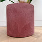 Close-up of the textured rose pink concrete surface of the 24cm pot